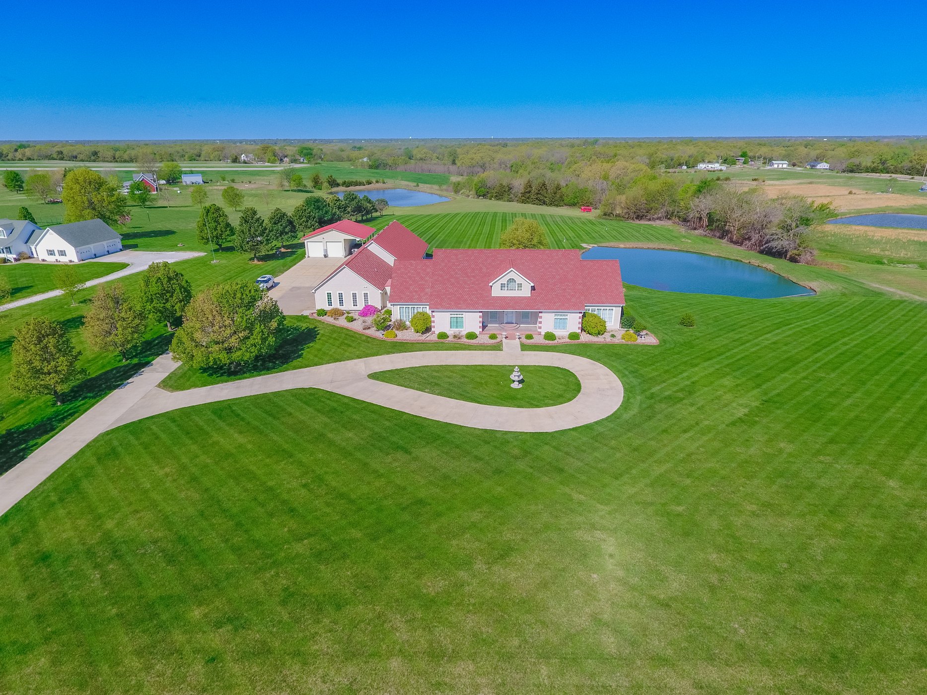 Aerial view of a Missouri home surrounded by lawn and countryside